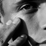 Model applying LBH Skincare Prickly Pear Seed Oil to the cheek